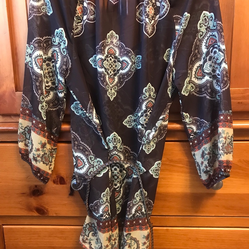Beautiful blouse by Dolled up by F.A.N.G. With tags